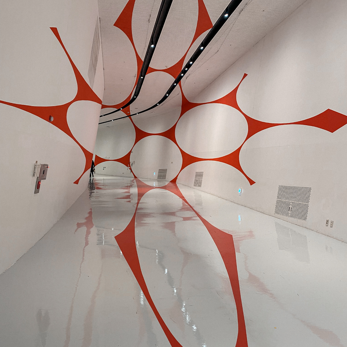 Red patterns from the Colours, Shapes, Movements Exhibition in the Design Plaza